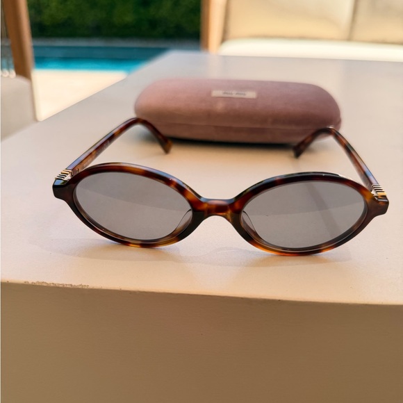 Miu Miu Accessories - Miu Miu oval sunglasses